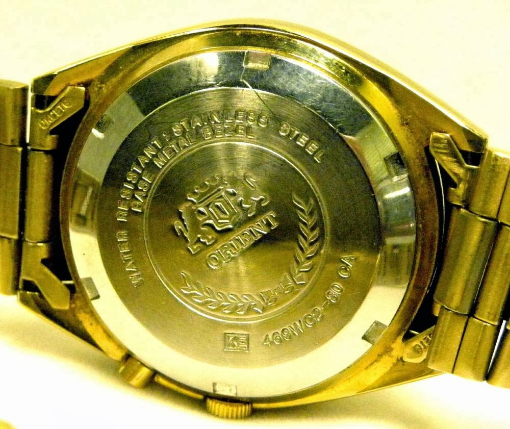 ORIENT CRYSTAL AUTOMATIC 21 JEWELS DAY DATE DIAL GOLD TONE STEEL orient-crystal-automatic-21-jewels-day-date-dial-gold-tone-steel