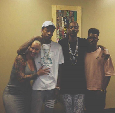 Amber Rose poses with her ex-Wiz Khalifa and Snoop Dogg