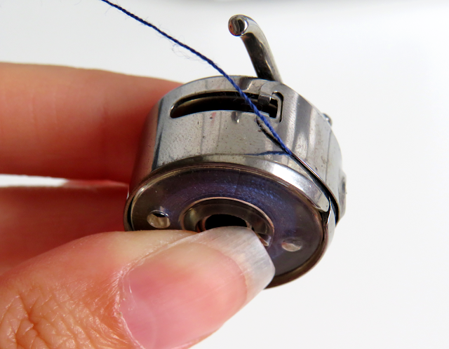 Hilo direccionado por el portacanillas