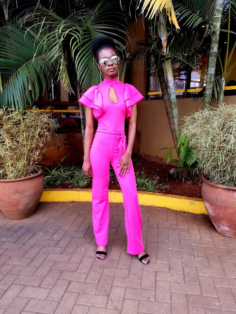 How To Pull Of A Jumpsuit That's Bright Pink