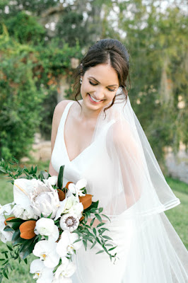 bride with large bridal bouquet