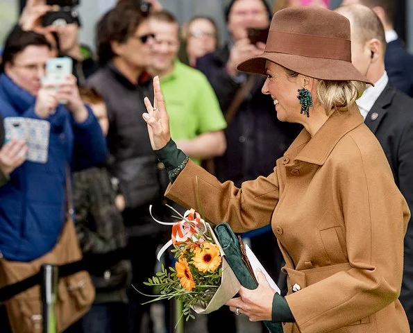 Queen Maxima wore Camel coat, Natan earrings, Lk Bennett boots, Fabienne Delvigne hat, Natan Skirt