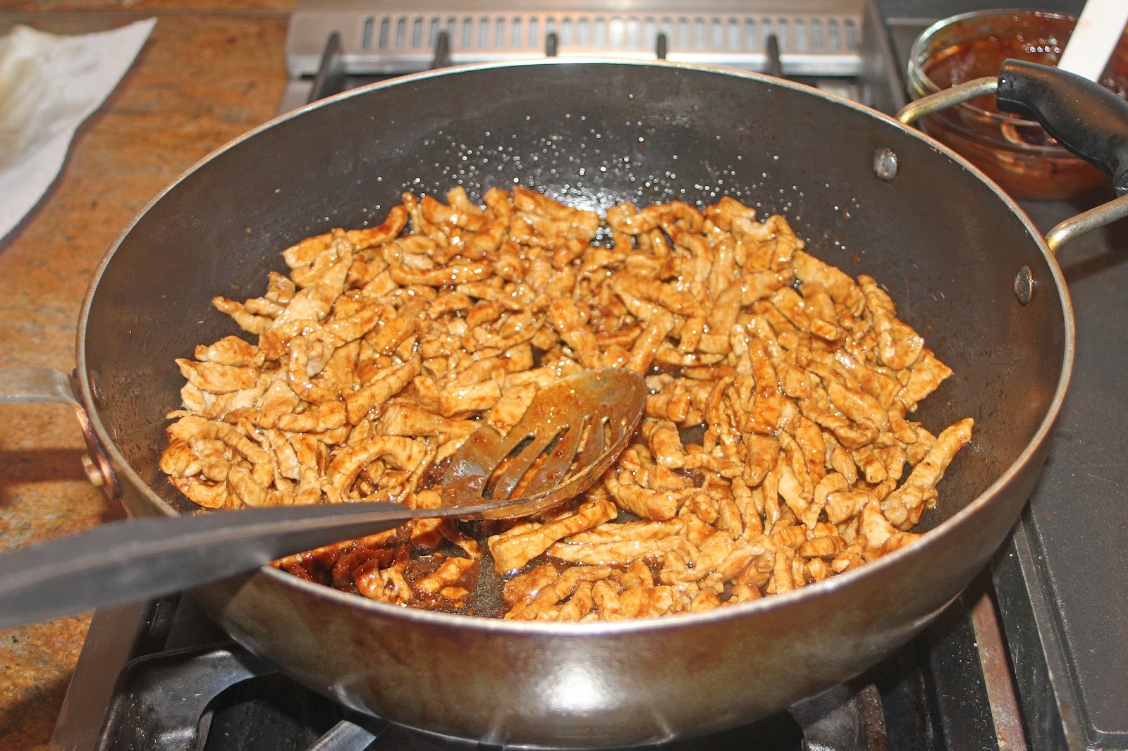 Jin jiang rou si
