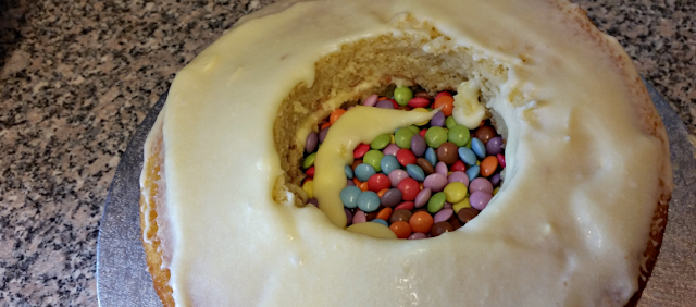 A Pinata cake being made