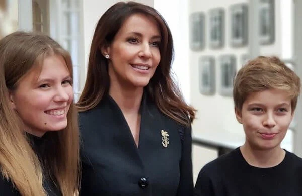 The International High School of Saint-Germain-en-Laye. Princess Marie carried YSL Saint Laurent Niki medium bag vintage leather in khaki