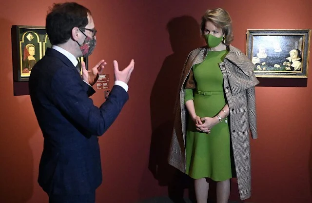Queen Mathilde wore a checked wool coat from Natan, and green wool dress from Natan