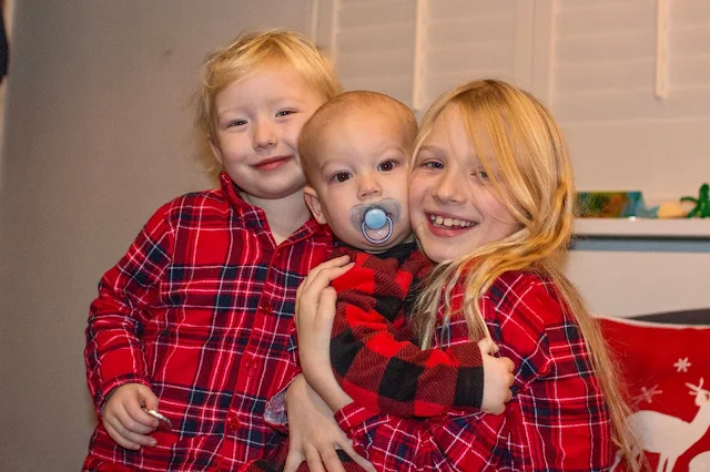 My 3 children in christmas pyjamas