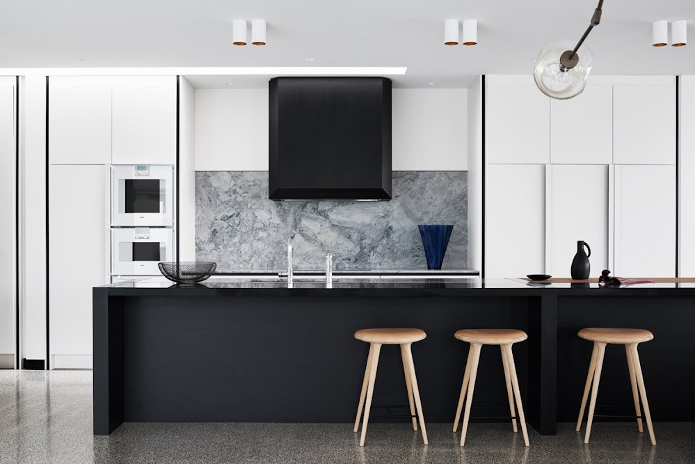 black-cabinetry-grey-marble-kitchen