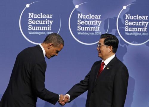 U.S. President Barack Obama bows before Chinese Premier Hu Jintao