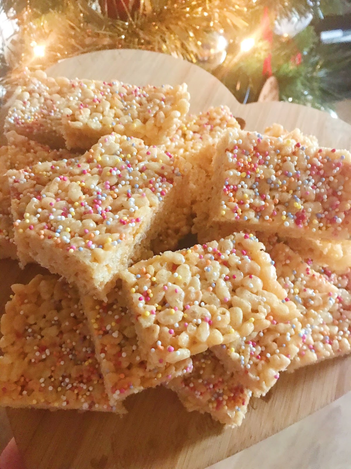 rice krispie squares on heart shaped chopping board