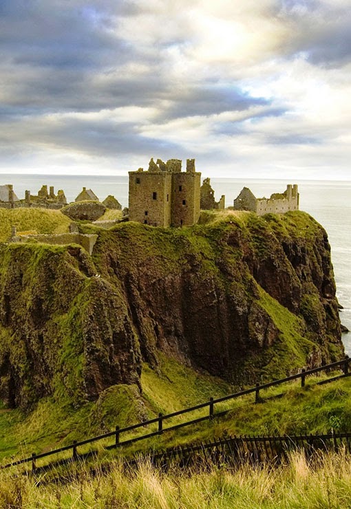  Dunnottar Castle  is a ruined medieval fortress located upon a rocky headland on the north-east coast of Scotland, about 3 kilometres  south of Stonehaven. The surviving buildings are largely