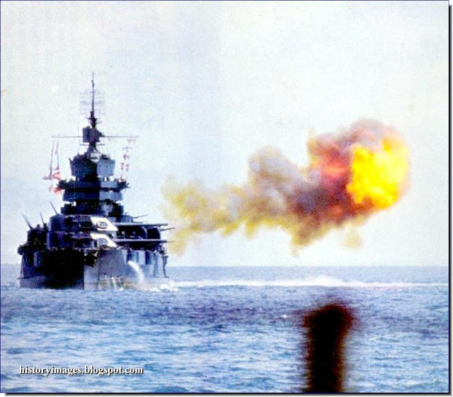 American battleship USS Idaho fires  Japanese fortifications Okinawa