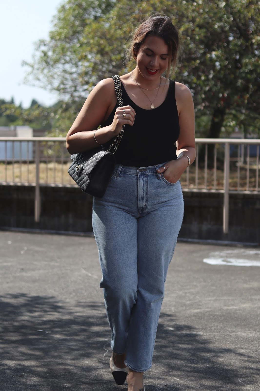 90s outfit idea 2019 levis dad jeans blogger chanel jumbo bag aleesha harris