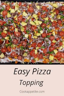 This is a bbq bacon hawaiian pizza recipe made from scratch with soy sauce and bbq worcestershire sauce topped with pineapple, bell peppers, onions and tomatoes.