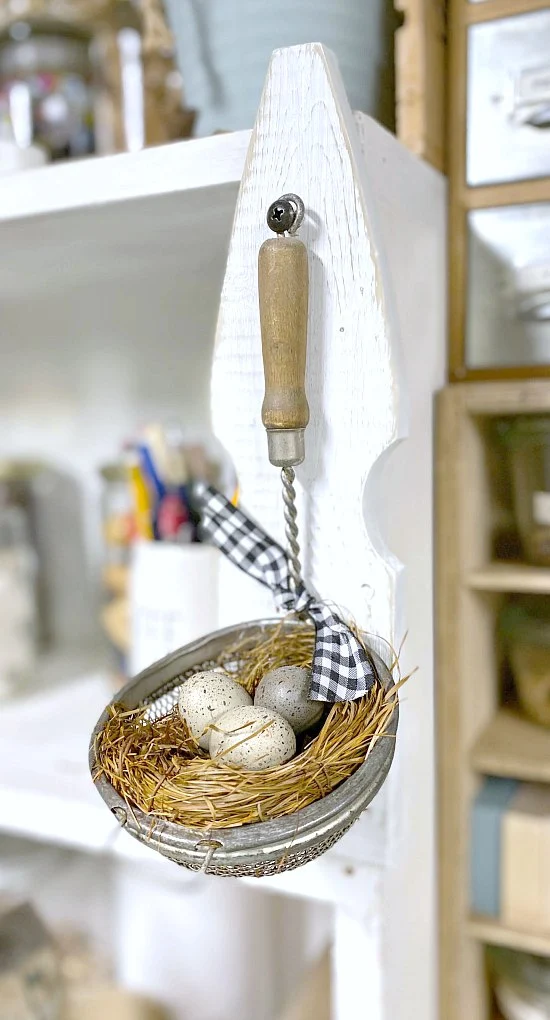 Spring nest from vintage strainer