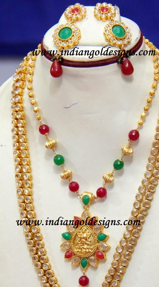 Gold and Diamond jewellery designs: lakshmi devi and beads jewellery