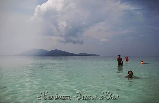 playing on the beach of the small pine in Karimun Jawa