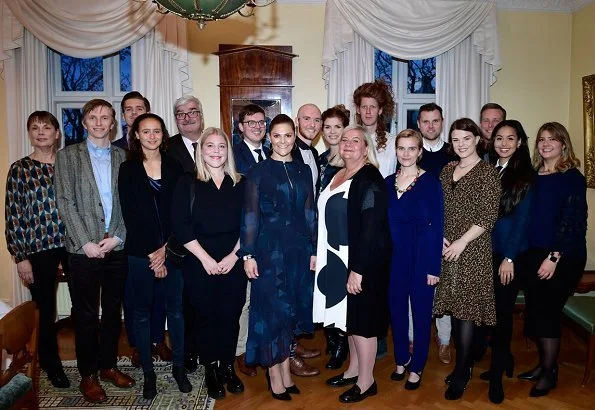 Crown Princess Victoria wore StarStudio PR Baroque pearl earrings, a new printed dress by Rodebjer. HM Dark blue dress