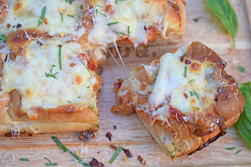 Open faced meatball sliders or mini-subs