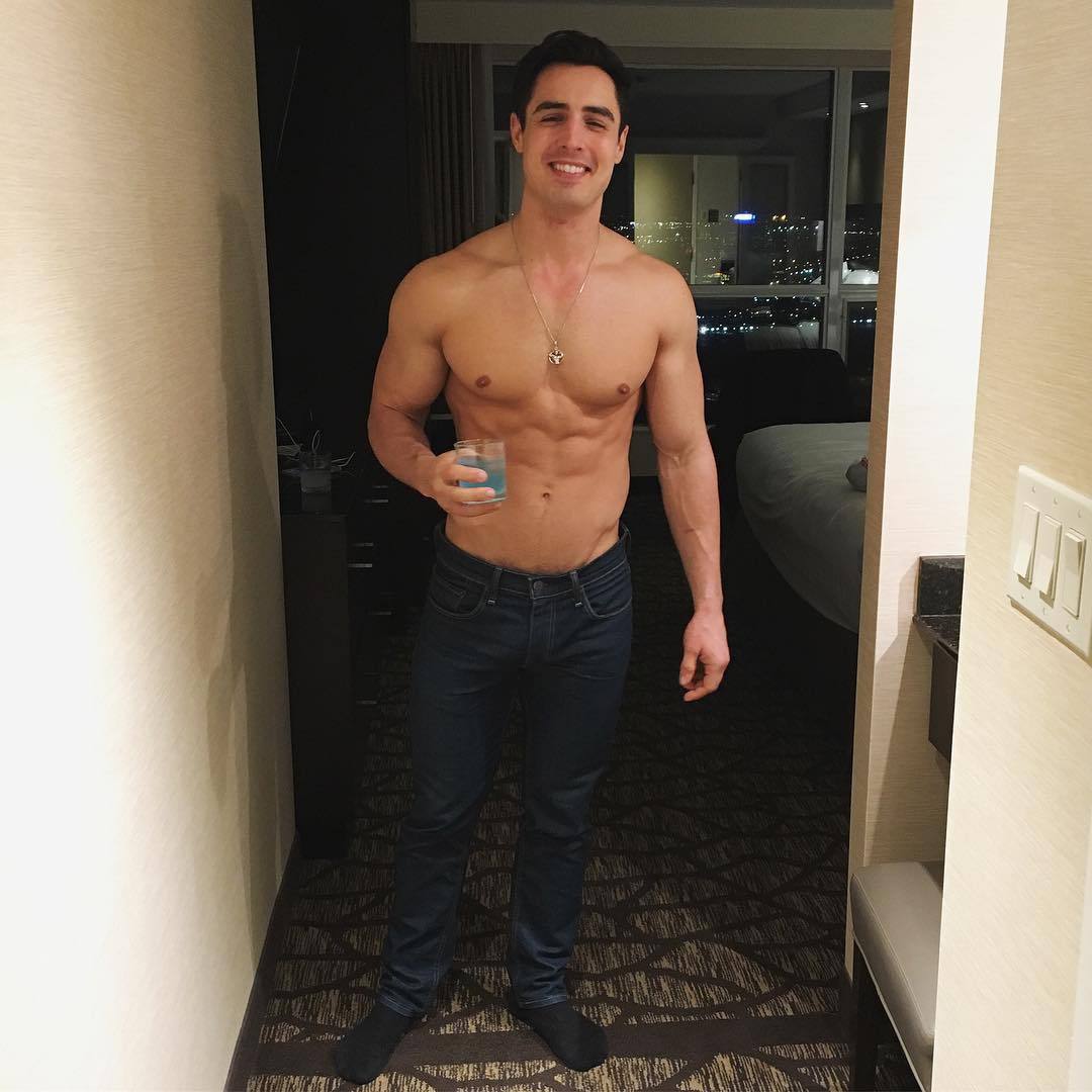 beautiful-guy-fit-shirtless-body-smiling-rob-monroe-drinking-cocktail-hotel-room