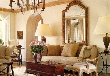 Pamela Pierce designed living room in her own European country home filled with antiques and white. #frenchcountry #livingroom #pamelapierce #interiordesign