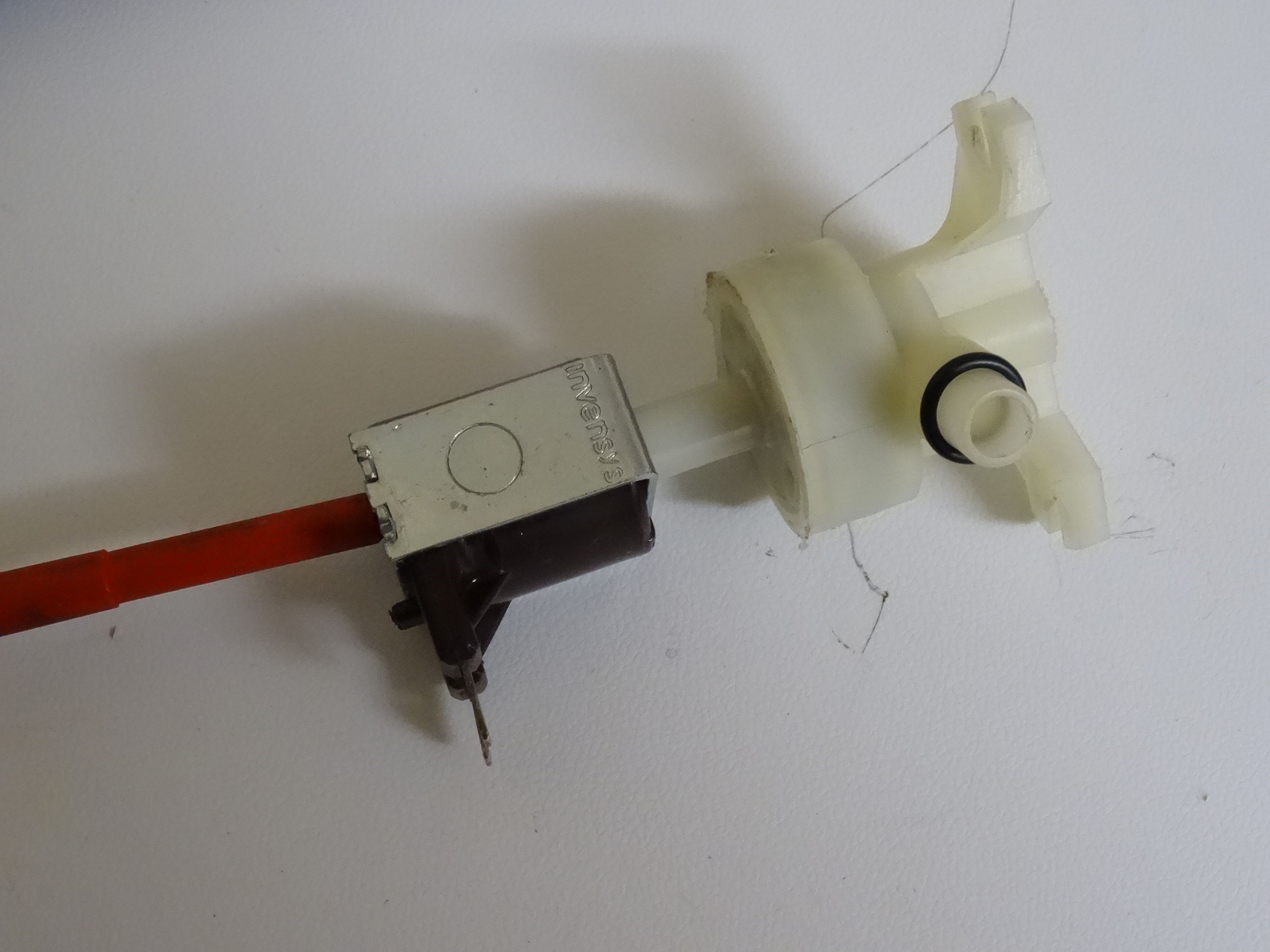 Electrical shower fault finding and repair Electric shower solenoid removal from inlet solenoid