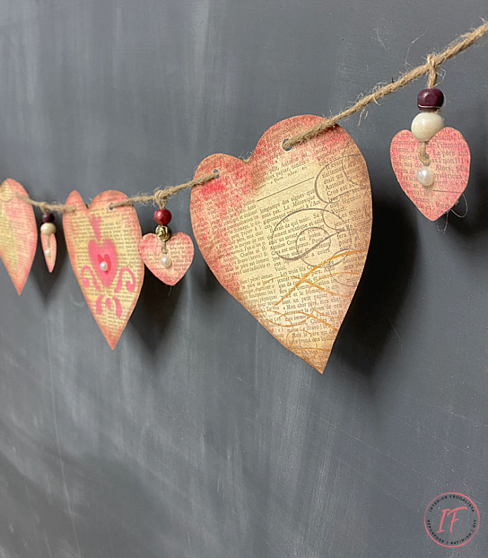 How to make a simple Victorian Vintage-style Valentine heart banner with newsprint scrapbook paper. A budget-friendly Valentine mantle garland craft.
