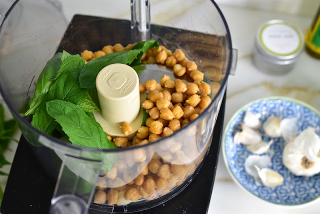 Mint and chickpeas in processor