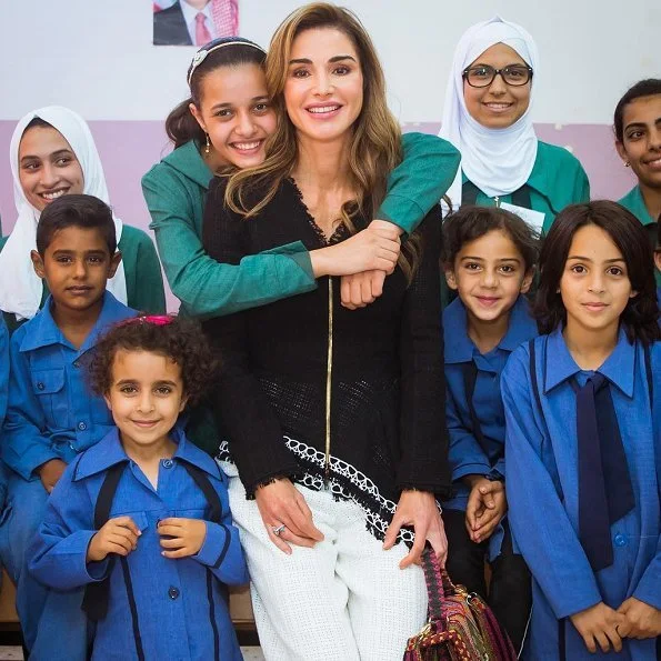 Queen Rania wore Roland Mouret Hayton open-weave cotton jacket and cotton trousers, Gianvito Rossi pumps