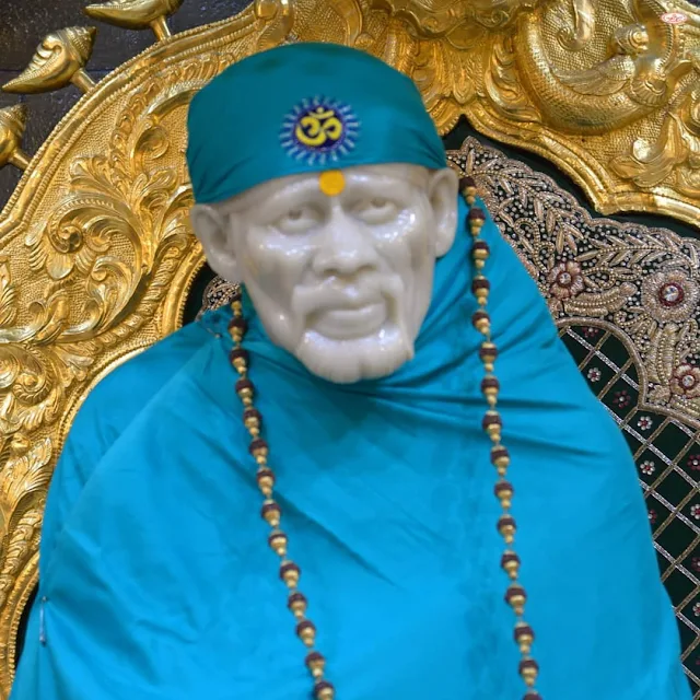 Sky Color Clothes wear Sai baba in this images 