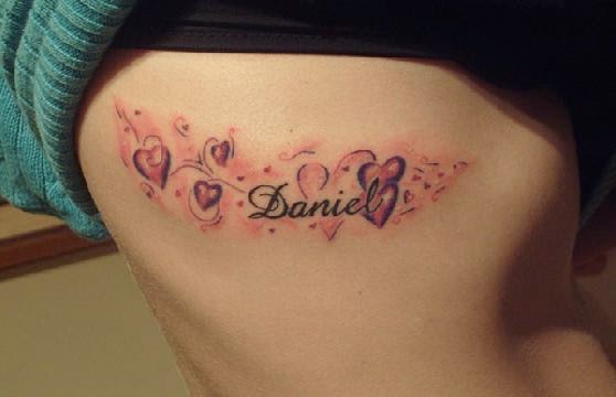 daniel tattoo name design ribs