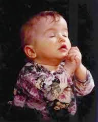Criança a rezar
