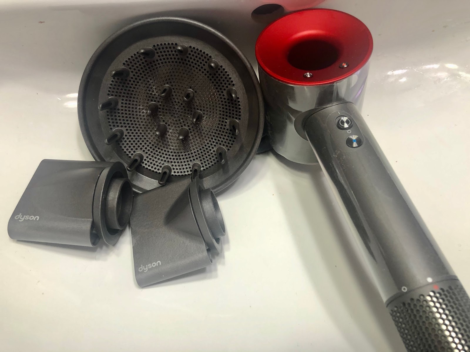 The Dyson Hair Dryer, it's not just blowing hot air at you. SheShe