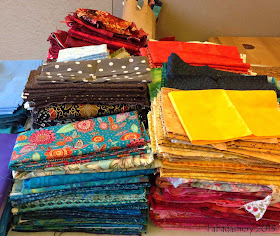 Quilt Fabric sorted into colour families