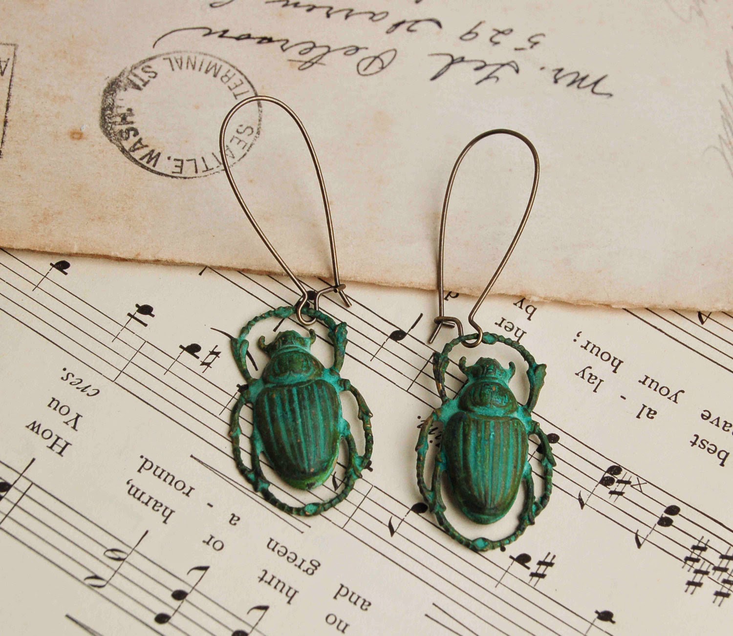 https://www.etsy.com/listing/89823023/steam-punk-green-beetle-earrings?ref=shop_home_active_5&ga_search_query=beetle