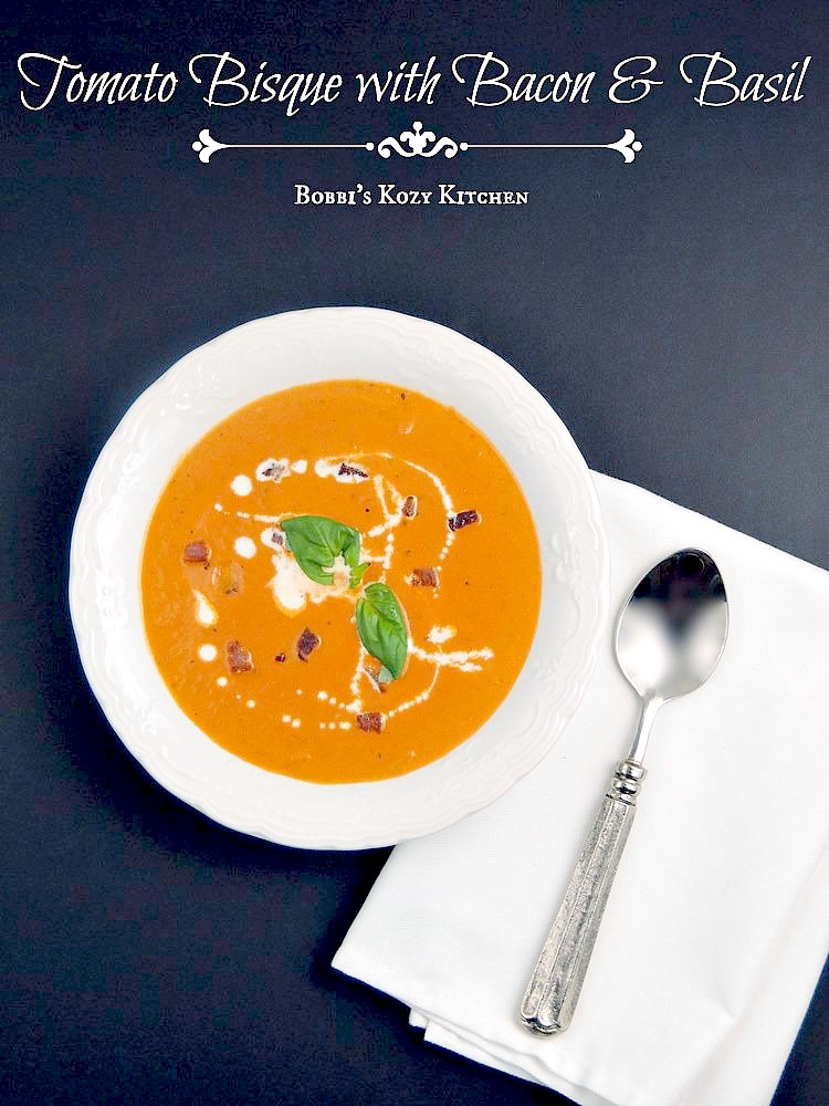 This Tomato Bisque with Bacon and Basil recipe is so rich and creamy you will want to eat the whole pot! #tomato #bacon #basil #soup #bisque #easy #recipe | bobbiskozykitchen.com