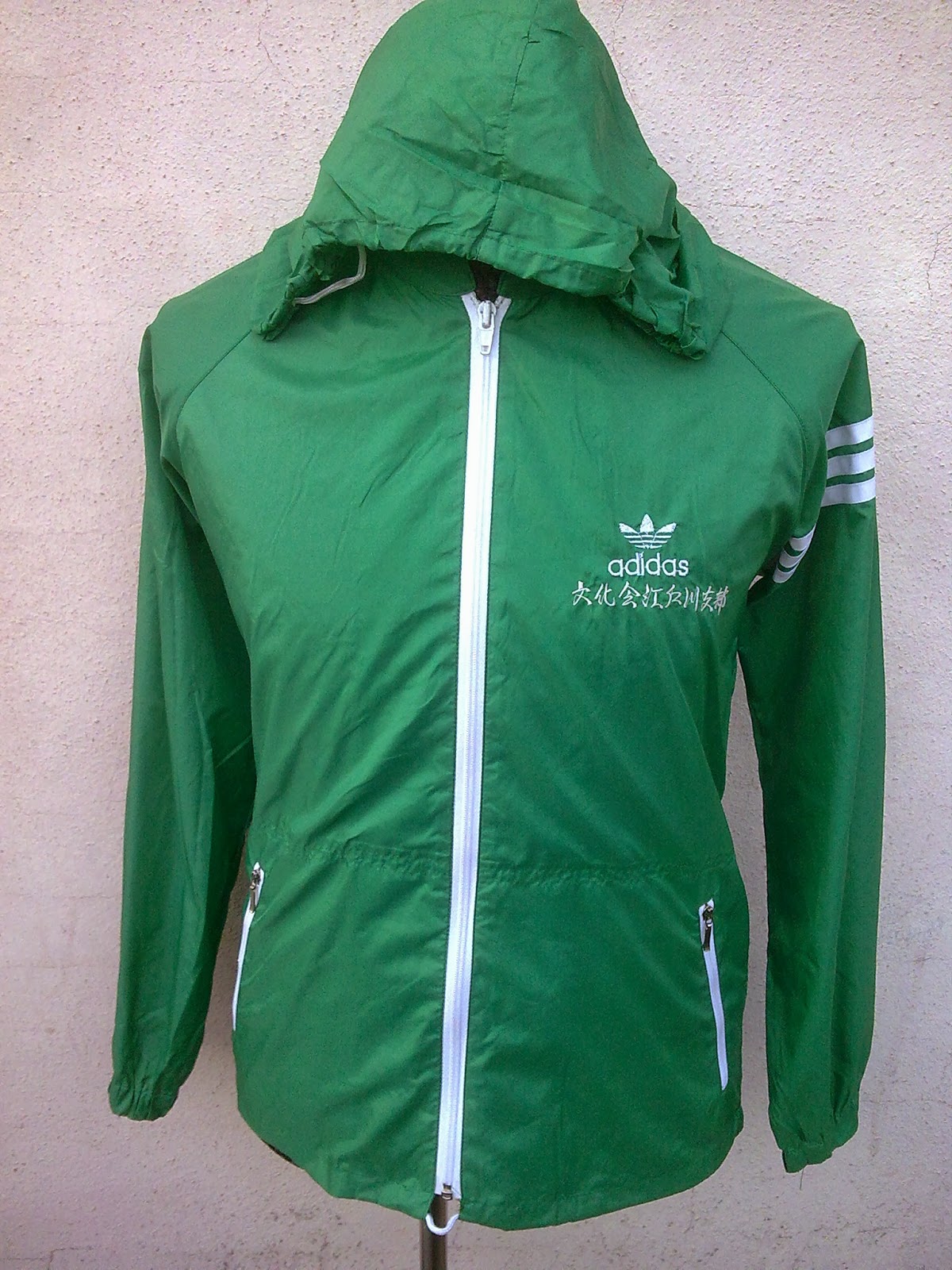 green windbreaker