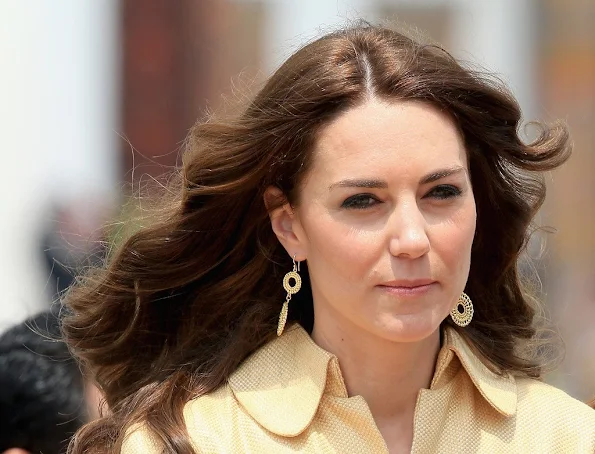 Prince William, Duke of Cambridge and Catherine, Duchess of Cambridge arrive into Paro International Airport for the first day of a two day visit to Bhutan. Kate wore Emilia Wickstead soft-yellow gold bespoke coatdress