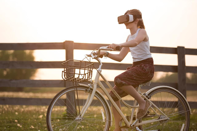 Augmented Reality girl on bicycle