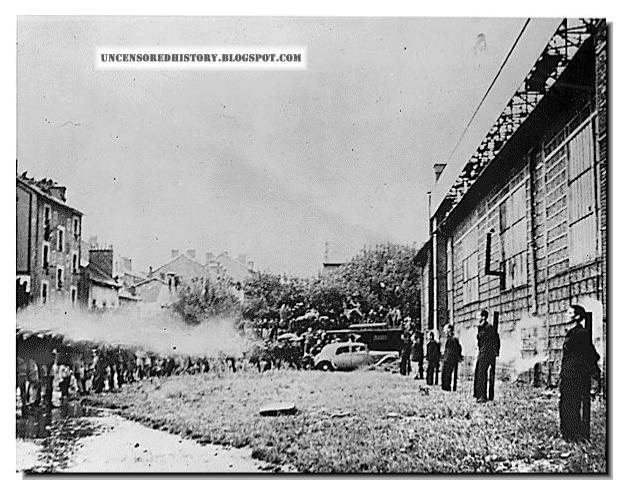 Members of French Forces of the Interior execute collaborators