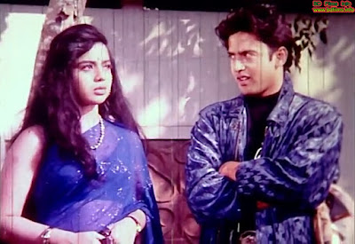 Praner Cheye Priyo (1997) Bangladeshi film Review Praner Cheye Priyo (1997) Bangladeshi film Review Raveena and Riaz in Praner Cheye Priyo (1997)   Introduction  Praner Cheye Priyo is a romantic Bangladeshi Bengali language film directed by Mohommod hannan in 1997 under the banner of Mass Media Ltd. The film is produced and distributed by Mass Media Ltd. The film story is written by Arif Mahmud. The film is starred by Riaz, Raveena (Bombay), Bobita, Wasimul Bari Rajib and Humayun Faridi in the lead roles and Bulbul Ahmed, Anwar Hossain, Abul Hayat and some others in some important supporting roles.   Raveena and Riaz in Praner Cheye Priyo (1997)   Castings:  Riaz as Rony/Sajib  Raveena (Bombay) as Milly  Bobita as Rokeya  Sabiha as …  Anwar Hossain as…  Bulbul Ahmed as Modhu Chowdhury  Abul Hayat as…  Nanturaz as…  Ahmed Shah Bulbul as…  Daniraz as…  Syed Akter Ali as…  Siraj Haider as…  Arun Robi as…  Atik as…  Morshed Hassan (Apu) as…  Setara Ahmed as…  Nila Ahmed as…  Jesmin Shilpi as…  Suraya as…  Mojibor as…  Selim as…  Jewel as…  Moslem as…  Mohsin as…  Nikson as…  Chunnu as…  Fakir Shah as…  SSayeed Shah Alam as…  Selim Abul Bashar Molla as…  Moulavi Mohsin as…  Harun as…  Jamal as…      Child Artists  Master Jewel as…  Shakha Madhury as …  Hridoy Sathi as…  And  Dildar as…  Rajib as Sompod Daku (Sompod Khan)  Humayun Faridi as Billat Ali    Important Crews:      Dance Artists: Mahmuda, Rasheda, Mina, sahida, Jahanara, Fatema, Mukta, Moushumi and some others… Mijan, Arif, Saiful, Mamun, Ilias, Tuhin, Yousuf.  Dance Director: Ilias Javed and…  Song: Runa Layla, Andrew Kishore, Khalid HassanMilu and Kanak Chapa.  Dialogue: Jaman Akter  Art Director: Kolontor  Music Composer: Ahmed Imtiaz Bulbul  Story: Arif Mahmud  Cinematographer: Sirajul Islam Siraj  Editor: Aminul Islam Mintu  Produced and Distributed by: Mass Media Ltd.  Screenplay and Directed by: Mohommod Hannan     Raveena and Riaz in Praner Cheye Priyo (1997)   Plot Summary:  Sompod an infamous robber kills a groom and marries the bride Shokhina, a daughter of a poor villager from Sujanagar village. On the other hand Billat Ali and his gangsters go to occupy an alluvial land of the villagers illegally. But Modhu Chowdhury and his partners defeat them in a strife and kill Billat Ali;s brother. Billat Ali had a friendly relationship with Sompod robber. But he cheats Sompod and on the other side tries to kill Modhu’s family by firing at night. Modhu Chowdhury is died but his wife Rokeya and two children Rony and Shirin leave the village anyway and reach into the town. But she loses her children and gets a shelter from Shokhina’s father. Shokhina commits suicide but leaves a child daughter Milly. On the other hand Sompod gives up all illegal activities and starts a new life with doing honest work and changes his name into Sompod Khan. He gets the child son Rony and looks after him considering himself as his father. In the third stage Shirin gets a shelter from a judge (Anwar Hossain). After many years, she becomes a barrister but wants to find out her lost mother and brother. In the middle, Rony or Sajib Khan falls in love with Milly. After resolving many problems, Billat Ali becomes a villain in the city and forces Milly’s grandfather to marry his grand-daughter with his son so that he can do any illegal works and she can help to pass his illegal goods from the airport gate as Milly works at the custom department in the Dhaka airport. At last, Sompod Ali Khan and Rokeya find out their children that Milly is Sompod Khan and Shokhina’s daughter and Sajib khan is Rokeya and Modhu Chowdhury’s son. Billat Ali can know the entire information. He kills Milly’s grandfather. But police arrests Sajib Khan considering him as criminal. But at the court Shirin can know that Sajib Khan is her brother abd she finds out her mother. The court punishes Sajib death penalty. Billat takes Shirin and Rokeya to his own area forcibly. On the other hand Sajib flees away to the area and starts fight agains them Sompod Khan kills Billat but Billat also kills Sompod with the same rifle and the relatives rescue from it.     Praner Cheye Priyo (1997) Bangladeshi Movie Poster    Personal Analysis: Review  It is a popular film in Bangladesh. Actually the audiences of Bangladesh are attracted to the romantic story and the love story performances and some popular songs. There are some popular songs sung by Runa Layla, Andrew Kishore, Khalid hassan Milu and kanak Chapa. The popular songs specially attract the audiences greatly. It is a successful commercial film in Bangladesh. I don't want to share about its cinematography or editing styles as master filmmakers. I this sector, the film will be in vain. But if I share the popularity of the film in the sector of songs, romantic story or performances, the film really will be successful in audiences' comments. Specially the performances of Humayun Faridi, Rajib, Bobita, Abul Hayat, Bulbul Ahmed and specially Riaz and Raveena are really attractive and skilled performance. Humayun Faridi is a famous performer as well as Rajib. So, actually their casting have contributed the film be successful by commercially or socially. On the other hand Riaz and Raveena in the lead role as hero and heroine have performed naturally and precisely. Their romantic casting or dialogues and romantic story have contributed the film to be attractive to the audiences and helped to be popular to the audiences. 
