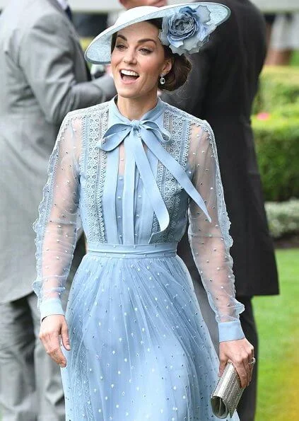 Duchess of Cambridge is wearing a custom Elie Saab dress. Queen Maxima is wearing Natan dress. Princess Eugenie and Zara Tindall