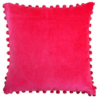 http://www.raggedrose.com/product/pink-velvet-pom-pom-cushion/