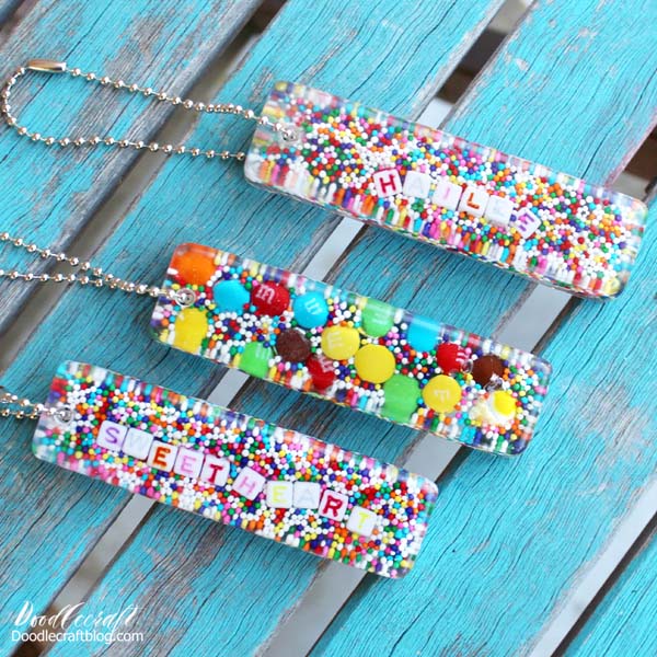 Candy sprinkles in resin key chains.