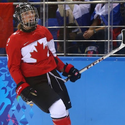 Meghan Agosta playing ice hockey for national team