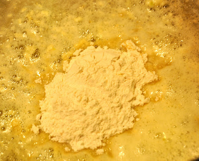 Triple cheese mac seasoning in a pan 