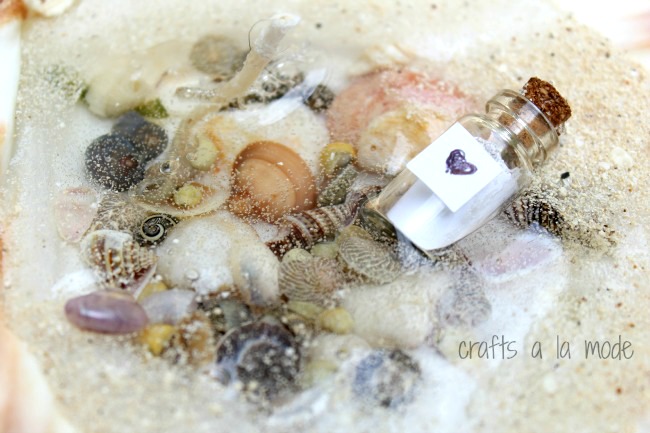 pretty little sea shells as candles