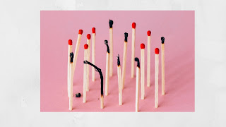 A group of matches with some burnt ones
