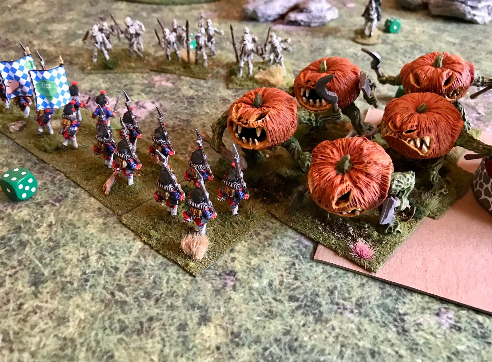 Munchkins battle Great Pumpkin Heads