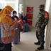 Babinsa Nogosari Ramil 0824/13 Rambipuji Dampingi Pelaksanaan Pelayanan Pemasangan Kontrasepsi KB Kesehatan